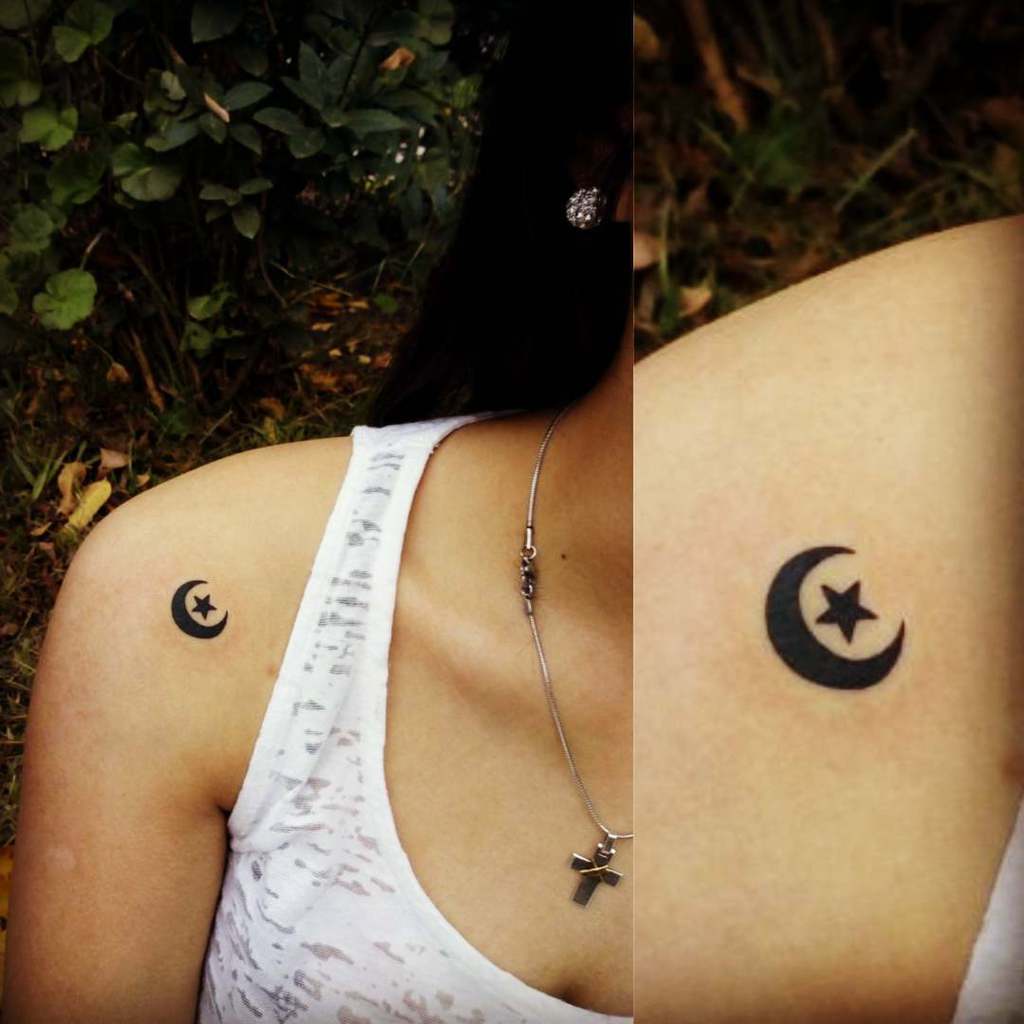 Crescent moon and stars tattoo on upper arm