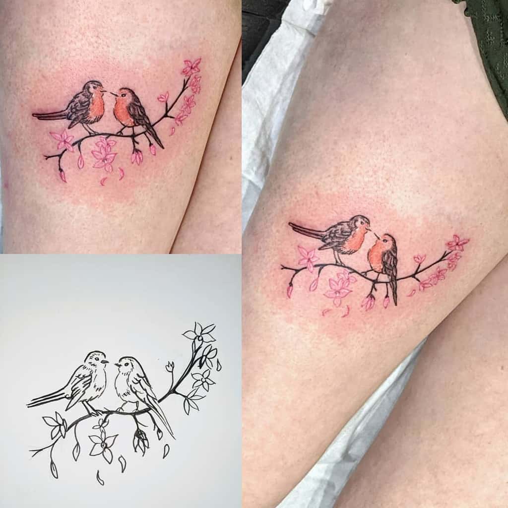 Tattoo of two robin perched on a cherry blossom branch; includes stencil and final colored design