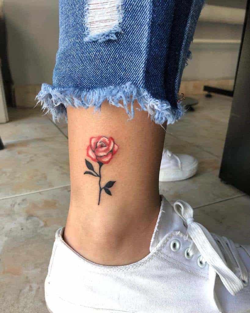 A small rose tattoo on an ankle