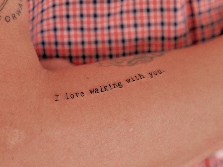 Small Typewriter Font Tattoo