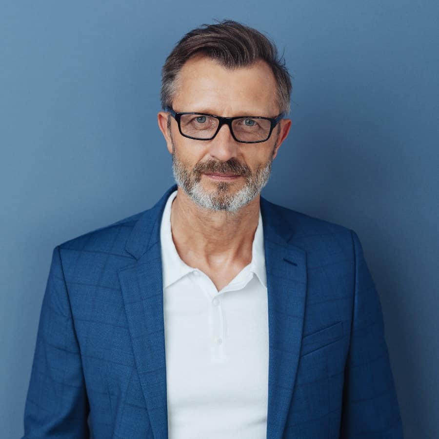 Smartly Dressed Older Man With Combover Haircut