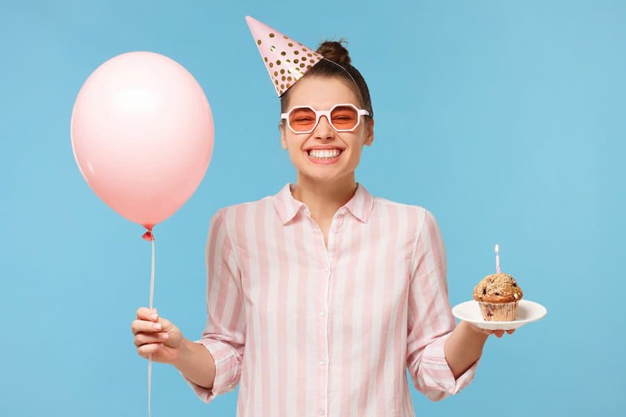Smiling woman celebrating her birthday