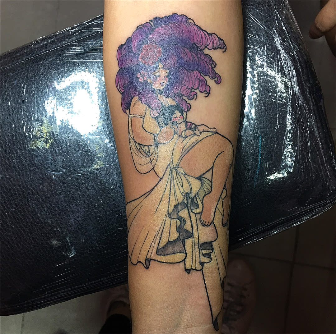 Colorful tattoo of Rose Quartz from Steven Universe cradling baby Steven, with flowing purple hair and a flowing dress, on the forearm