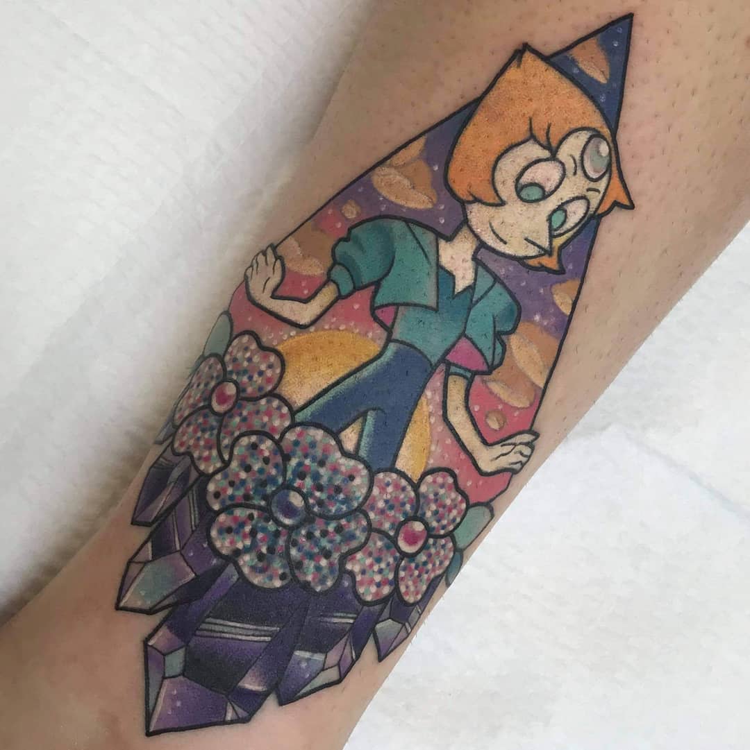 Colorful tattoo of Pearl from Steven Universe, surrounded by flowers and crystals with a cosmic background, on the leg