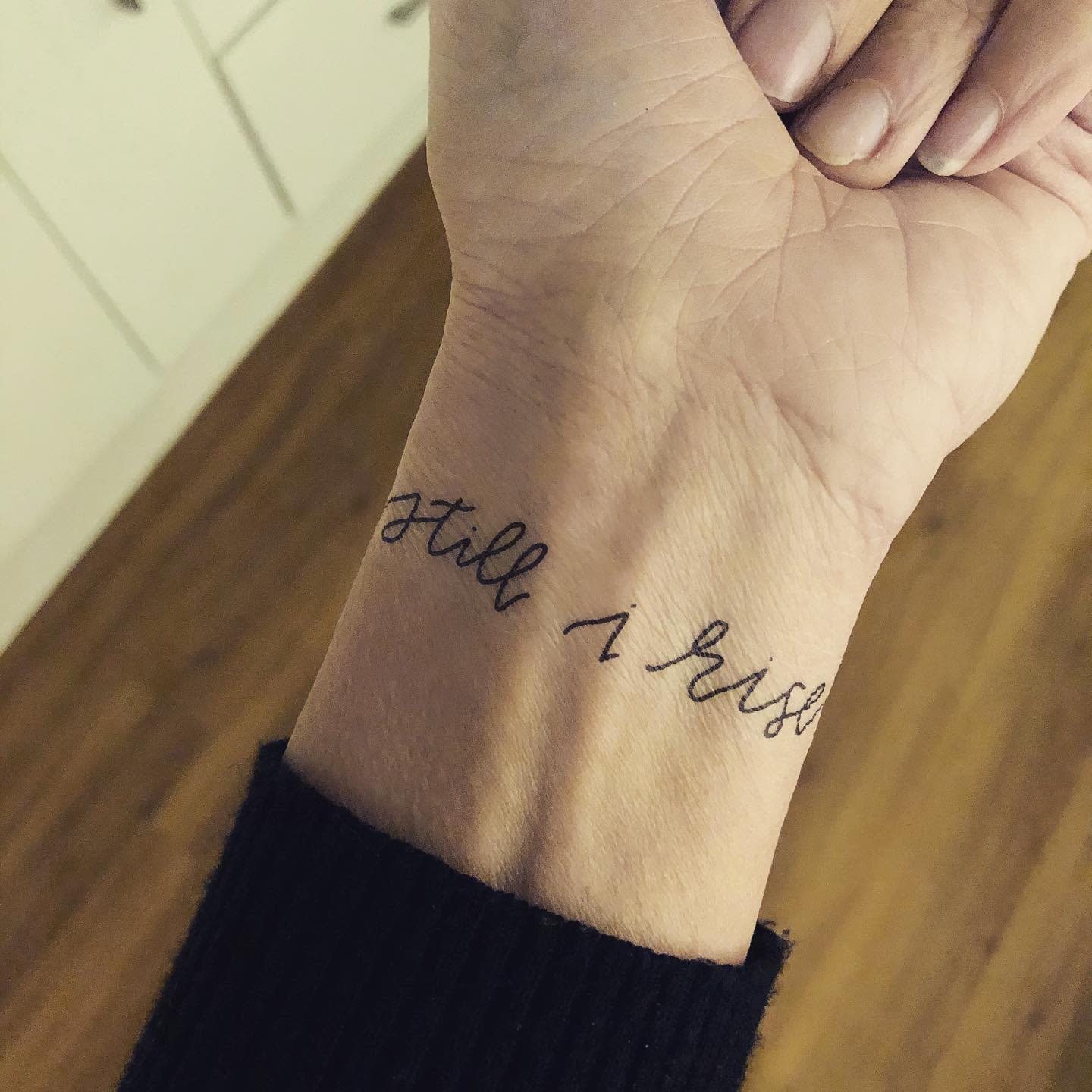 Wrist Still I Rise Tattoo