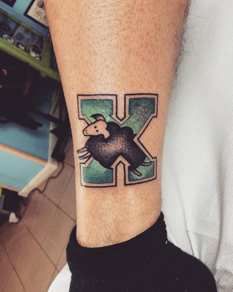 Straight edge tattoo of a black sheep with a green "X" background
