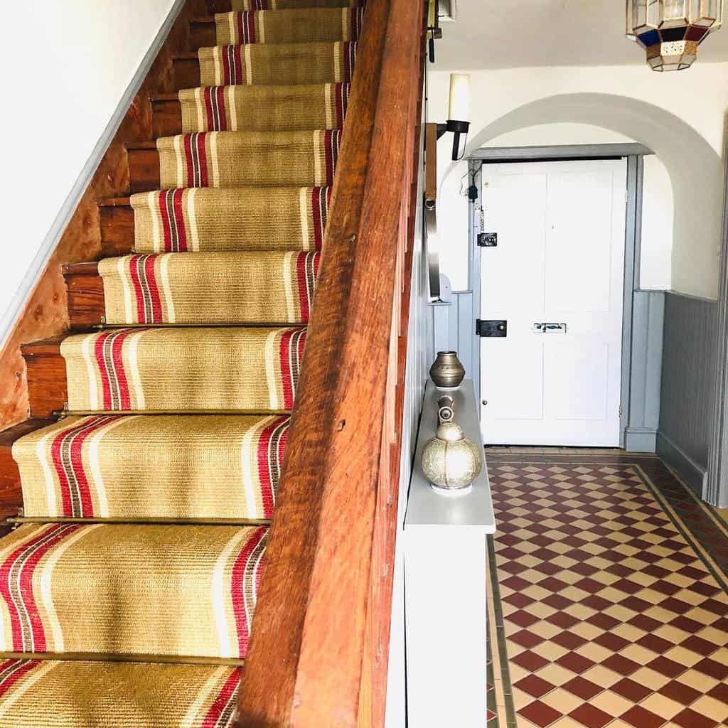 striped stair runner wooden stairs