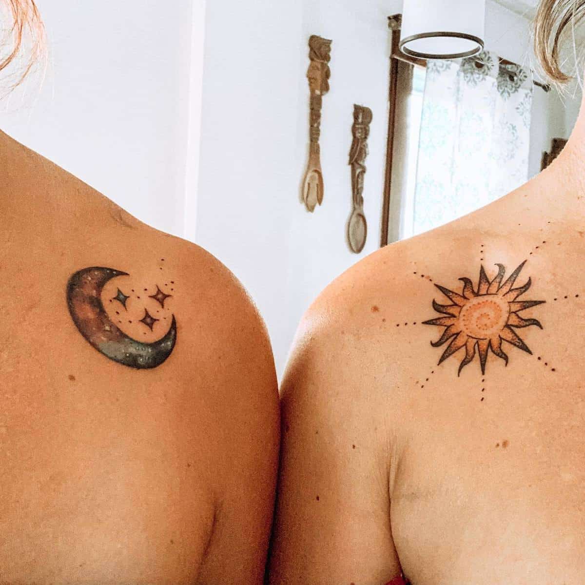 Crescent moon with stars tattoo and sun design tattoo