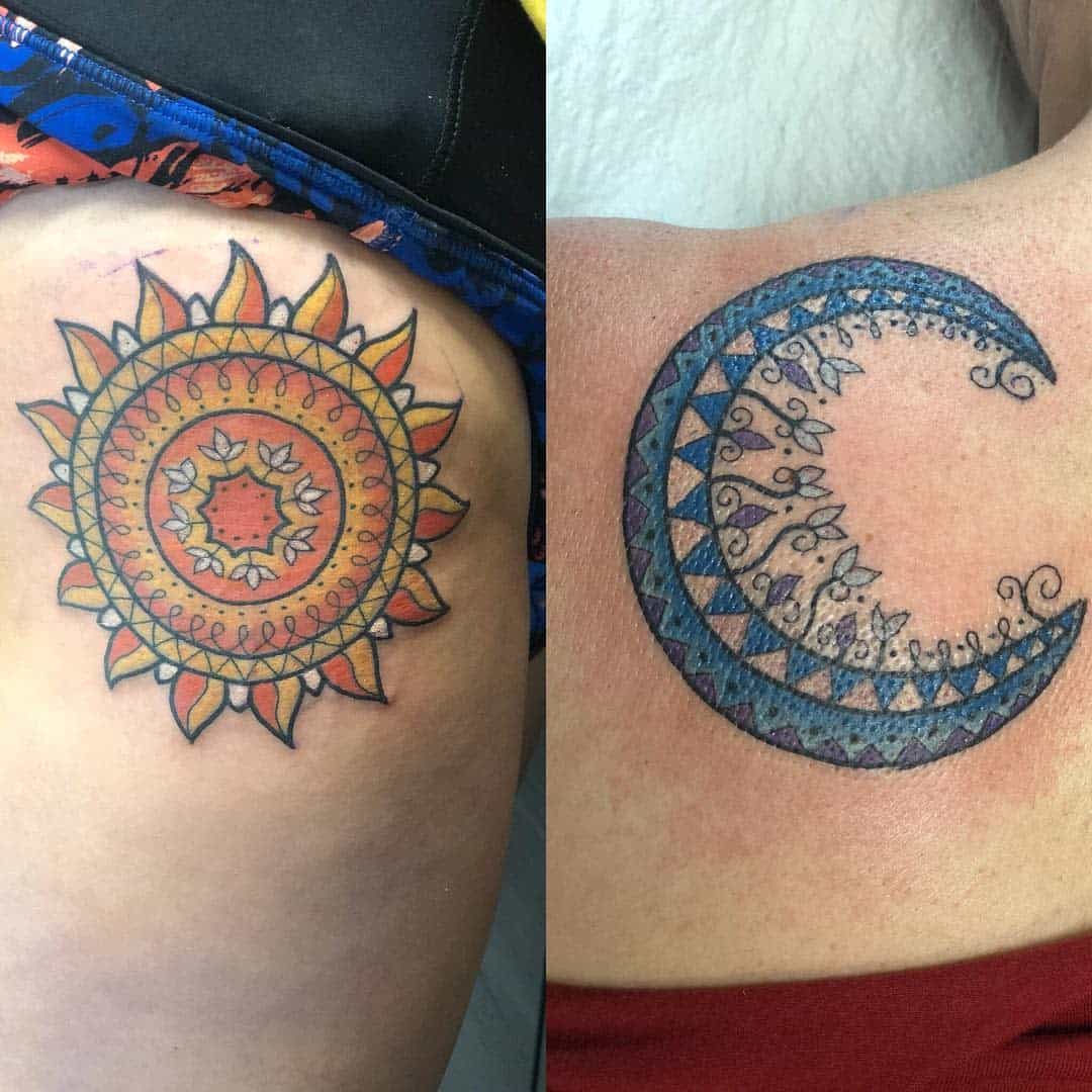 Colorful sun tattoo and blue crescent moon tattoo on different people's bodies