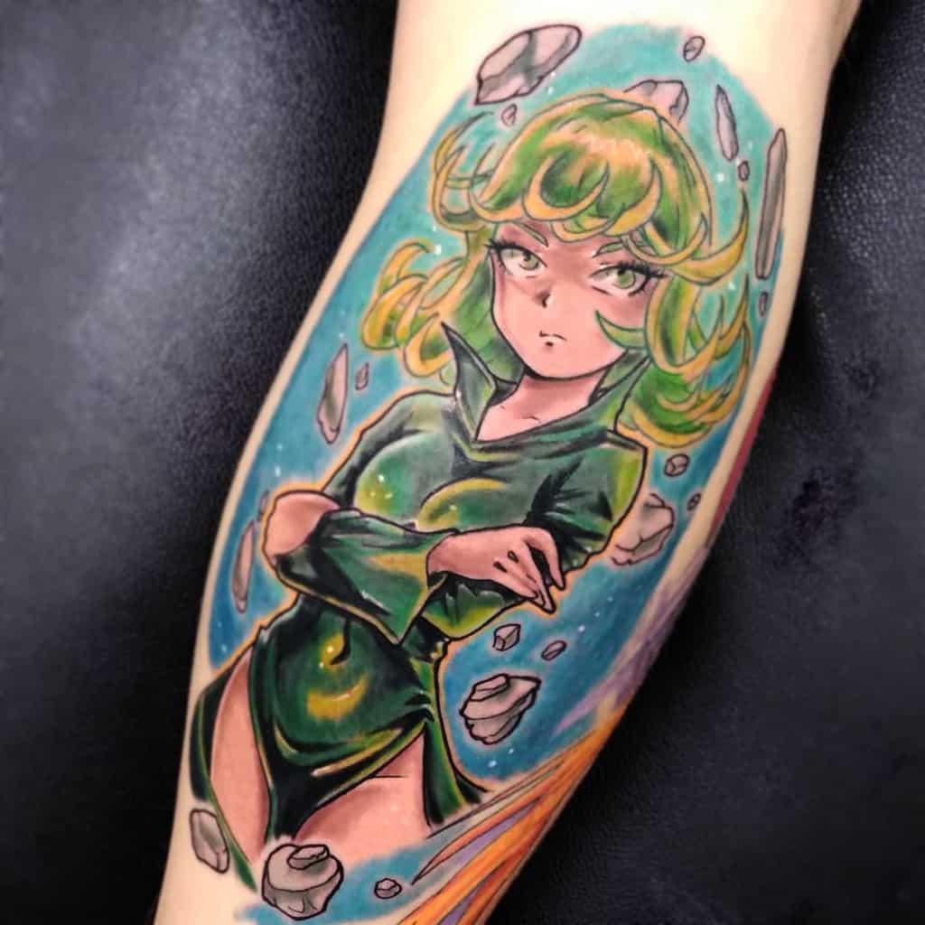 Vibrant tattoo of Tatsumaki from One Punch Man with glowing green hair, floating debris, and a cosmic background, emphasizing her psychic powers