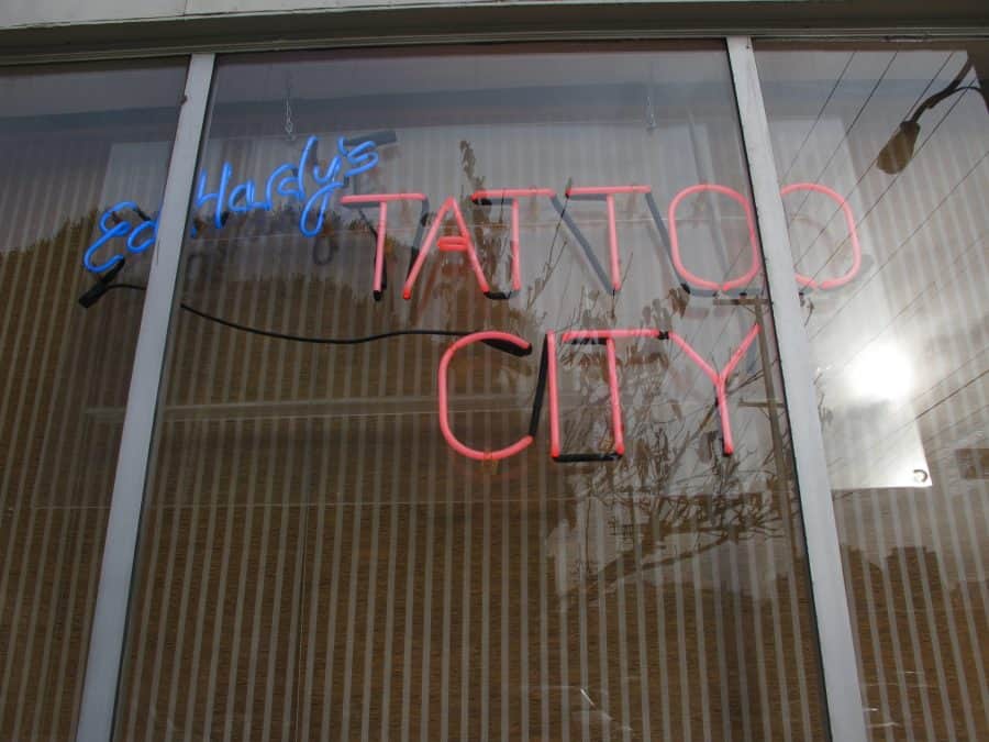 An image of Ed Hardy's Tattoo City in neon sign