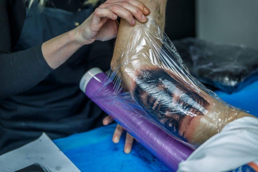 Tattoo Being Wrapped With Cling Film