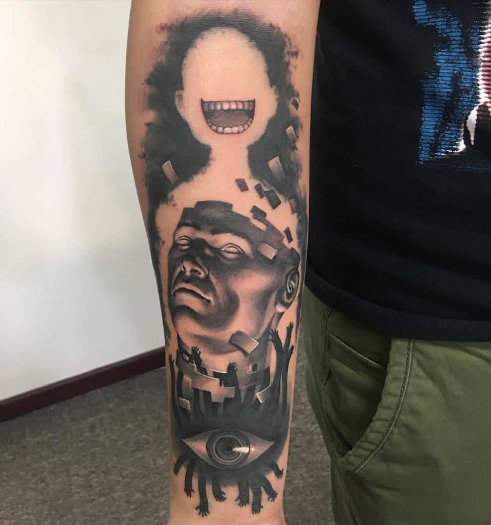 Fullmetal Alchemist tattoo of the Truth entity with its eerie grin, a fragmented human head, and an all-seeing eye