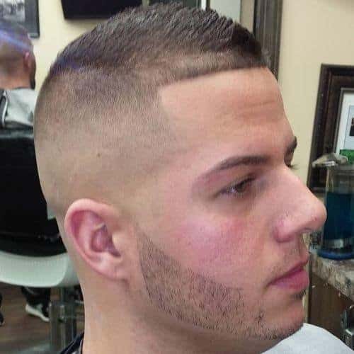 man with tight military fohawk hairstyle