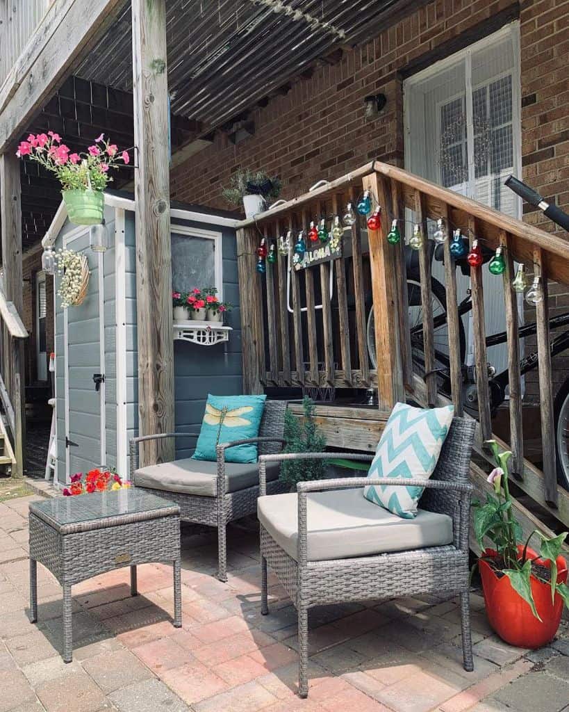 small paver patio on a budget with wicker furniture 