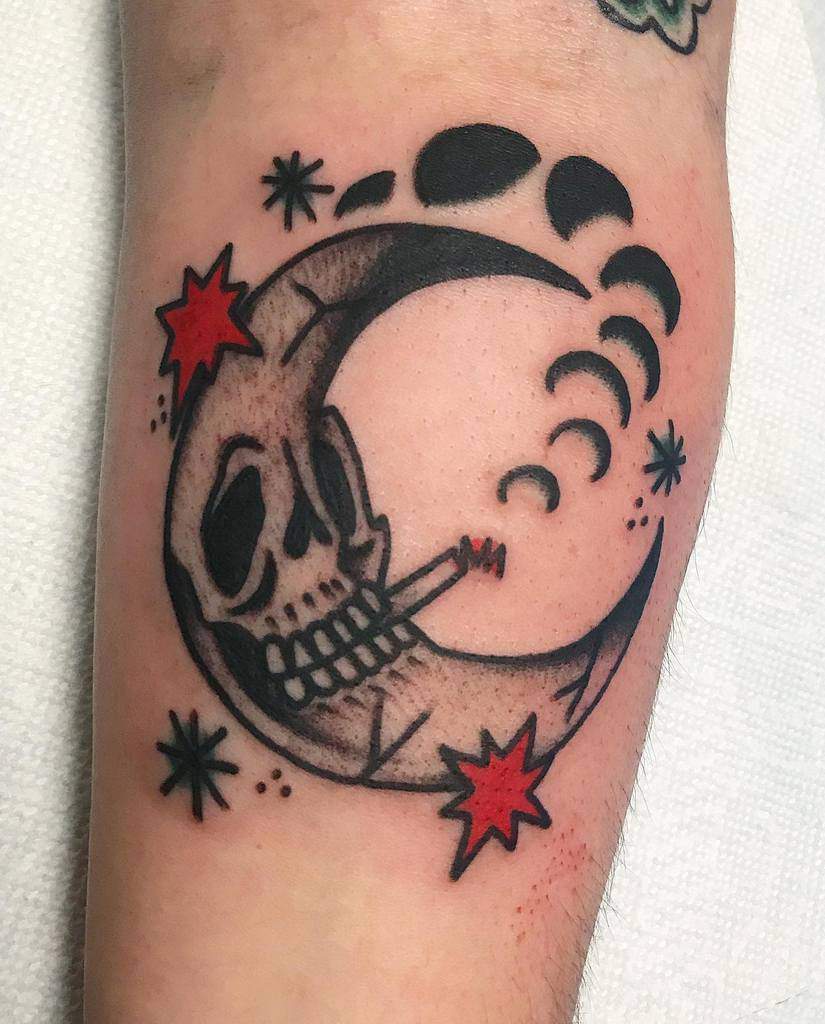 Crescent moon with a skull face, smoking a cigarette, surrounded by stars