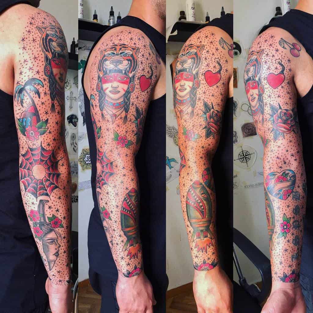 Traditional tattoo sleeve featuring a tiger head over a woman's face, hearts, roses, a rocket ship, and intricate stars and dots filler