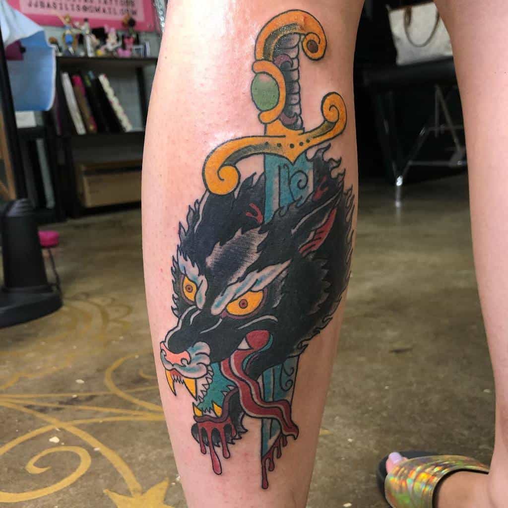 Traditional Wolf Leg Tattoo papifritas.tattoos