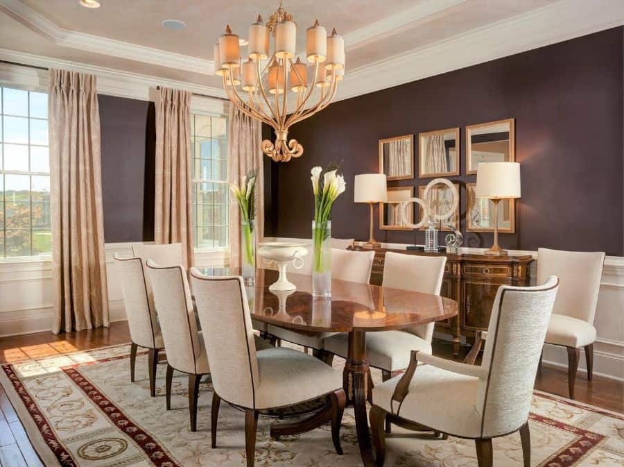 traditional chandelier dining table and chairs two tone gray and white walls 