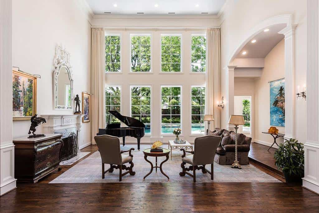 large living room with vintage furniture and gran piano