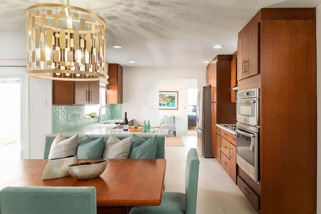 transitional living room kitchen with wood cabinets