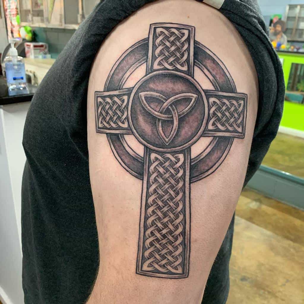 Tribal Cross Upperarm Tattoo susantattoo