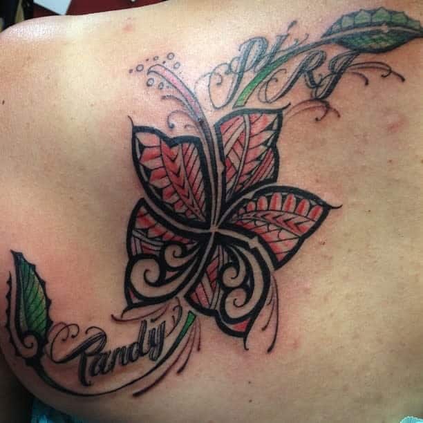 Tribal-inspired flower tattoo with intricate patterns, red accents, and the names "Randy" and "RJ" on the back