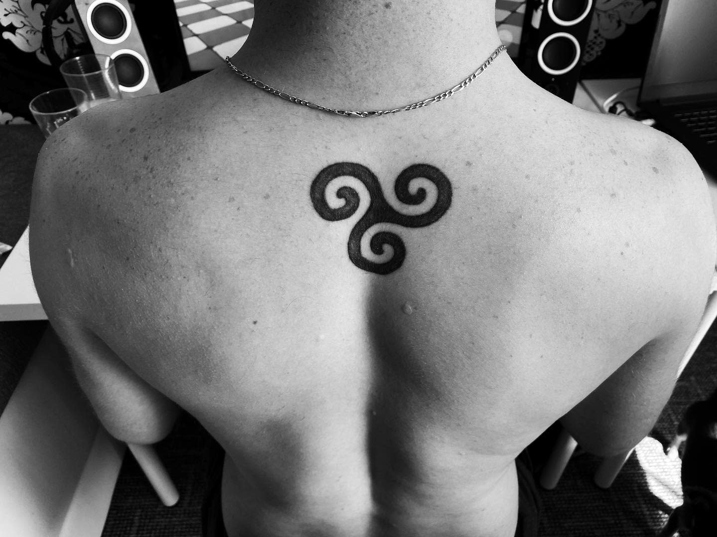 Black Triskelion Back Tattoo