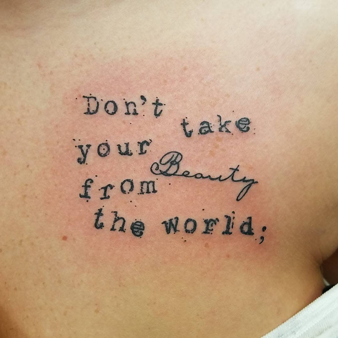 Tattoo on skin with the text "Don't take your Beauty from the world"