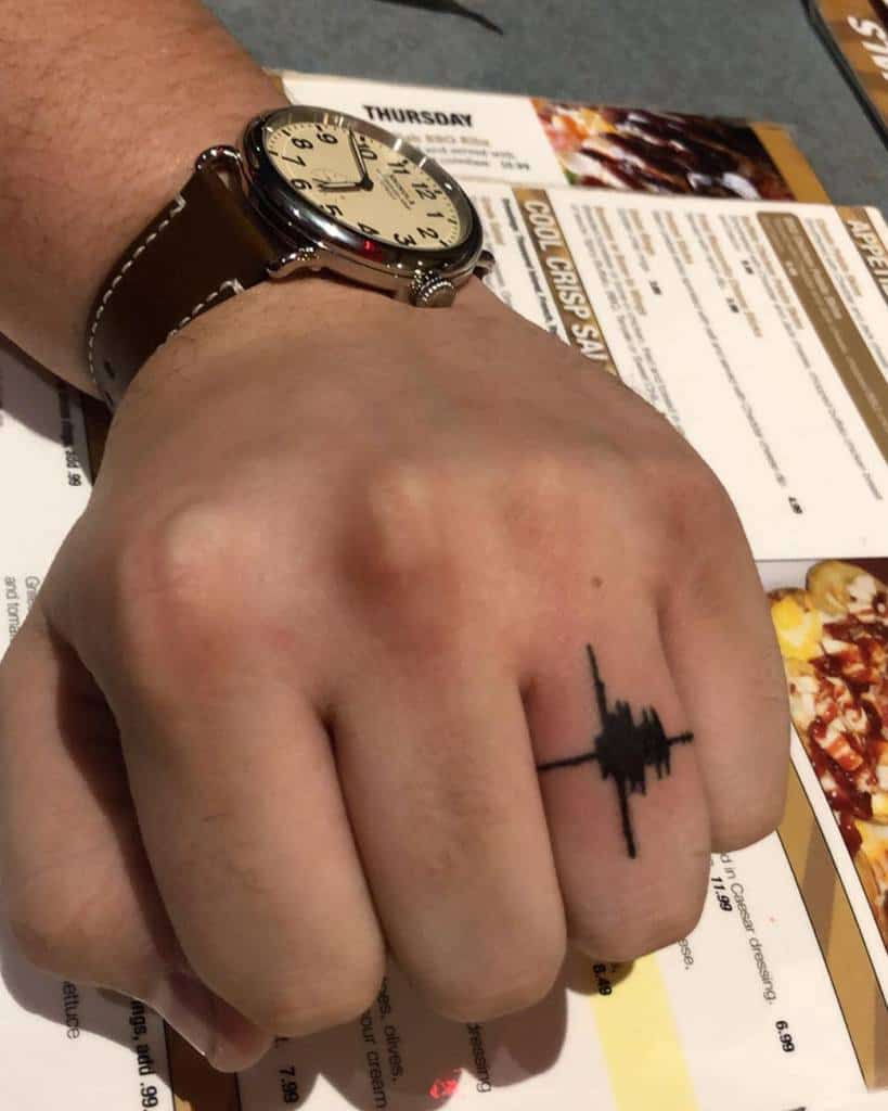 Intricate black ink sound wave ring tattoo design, showing peaks and troughs of the audio waveform