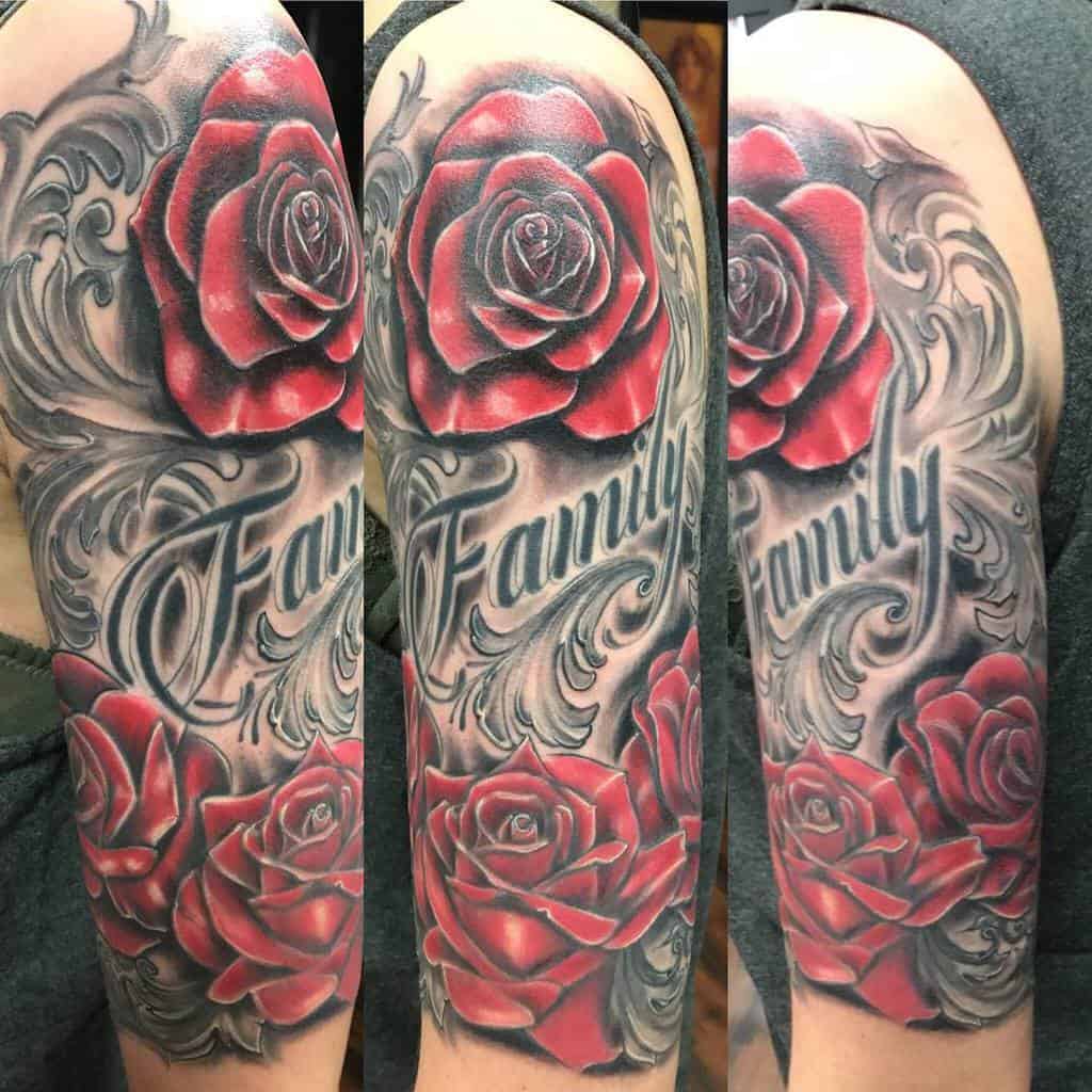 A striking tattoo sleeve showcases vibrant red roses intertwined with the word "Family" gracefully inked along the person's arm