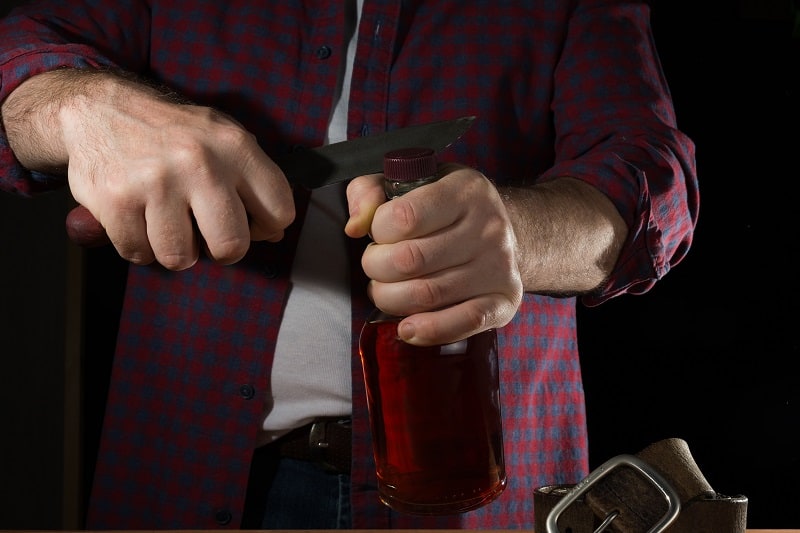 Use-a-Pocket-Knife-to-Open-a-Bottle