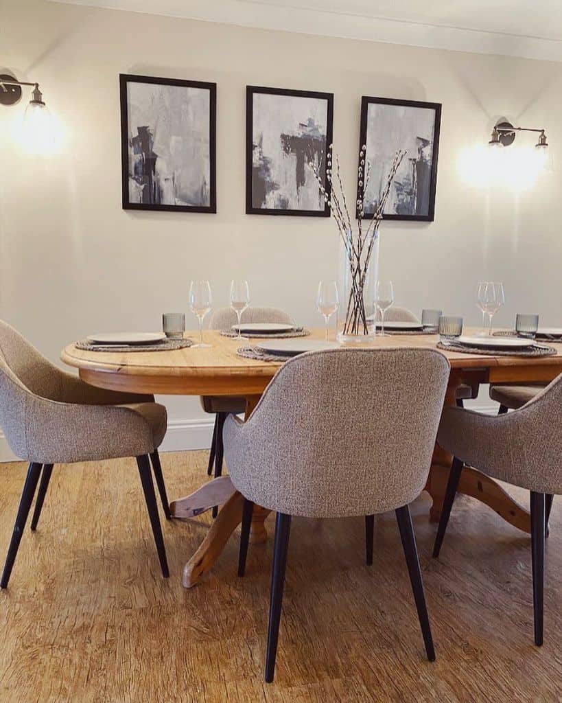 sconces wall lights dining room table and chairs framed wall art