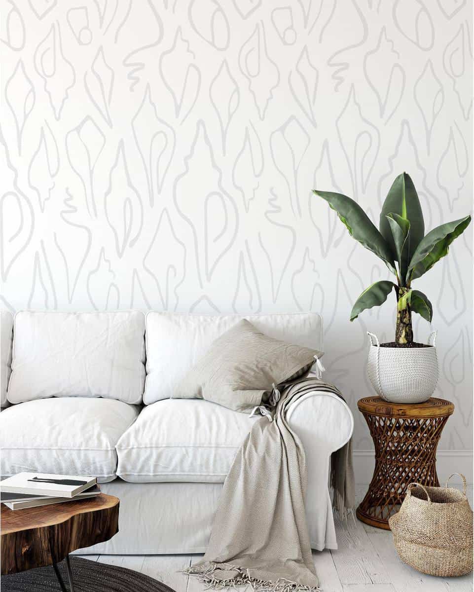 white pattern wallpaper with sofa