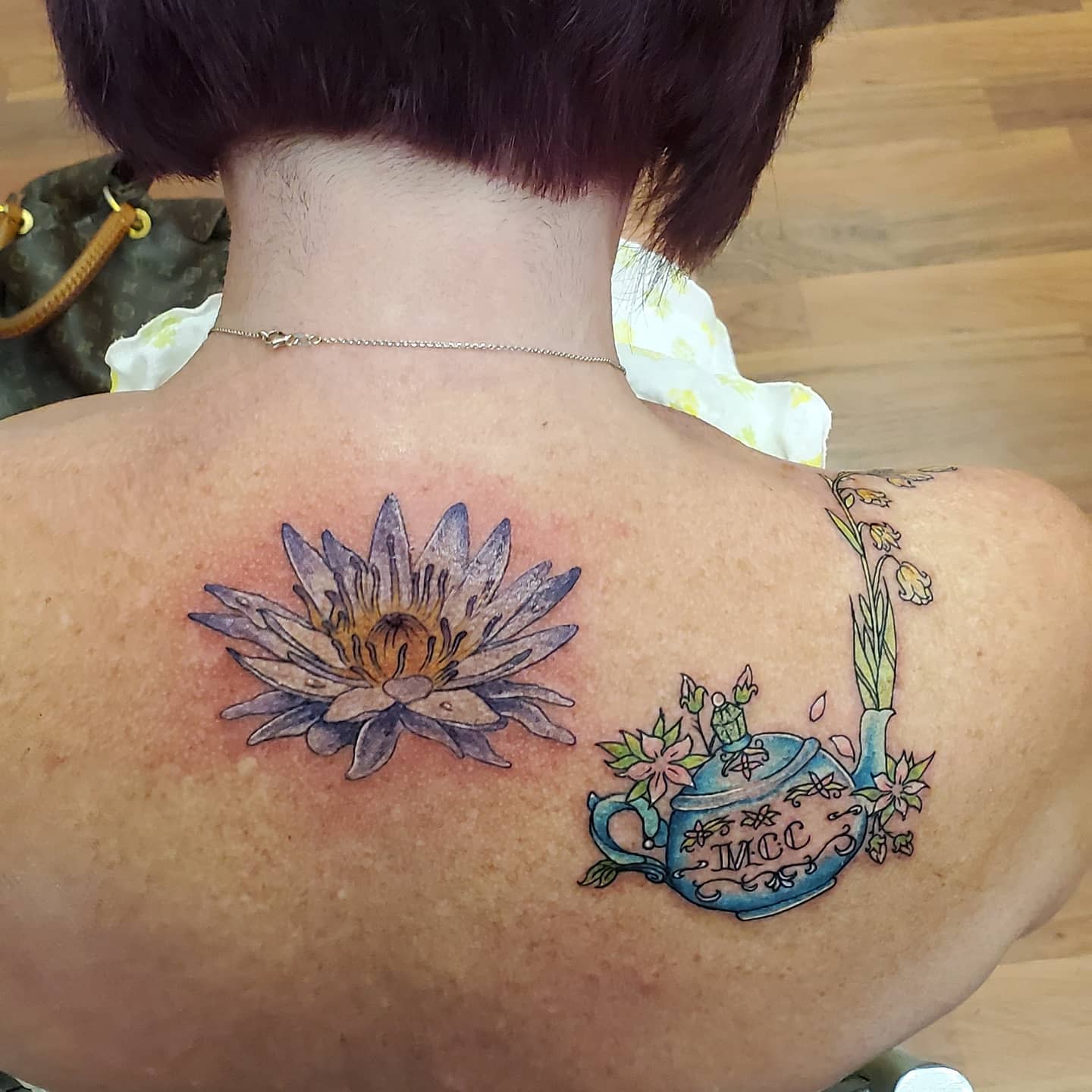 Water Lily Back Tattoo
