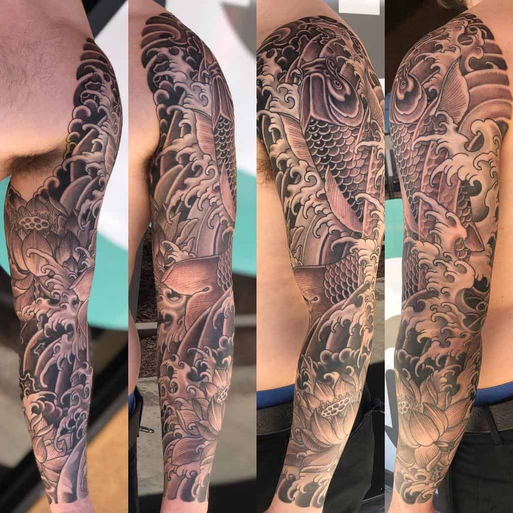 Full-arm sleeve tattoo featuring koi fish and waves
