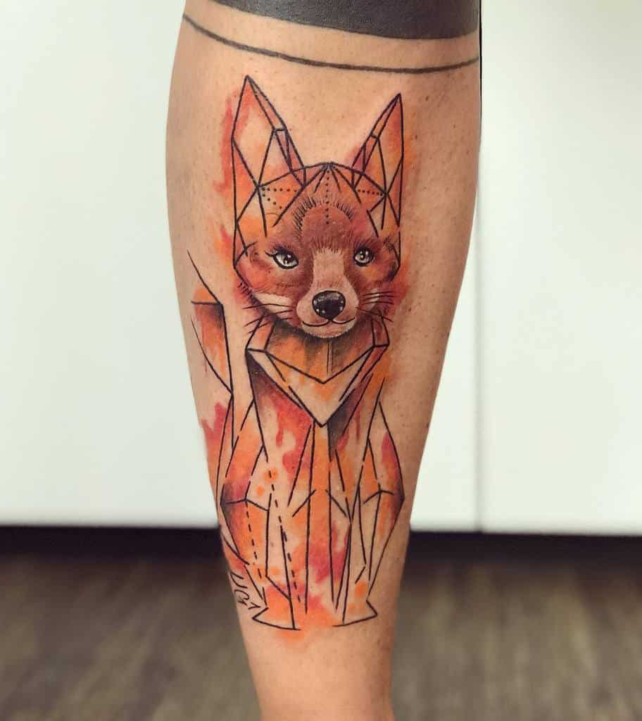 A stunning geometric fox tattoo on a forearm featuring abstract shapes and intricate lines