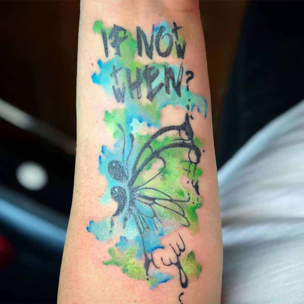 A colorful watercolor butterfly tattoo with a semicolon body, accompanied by the text 'If not now, when?', symbolizing urgency and mental health awareness