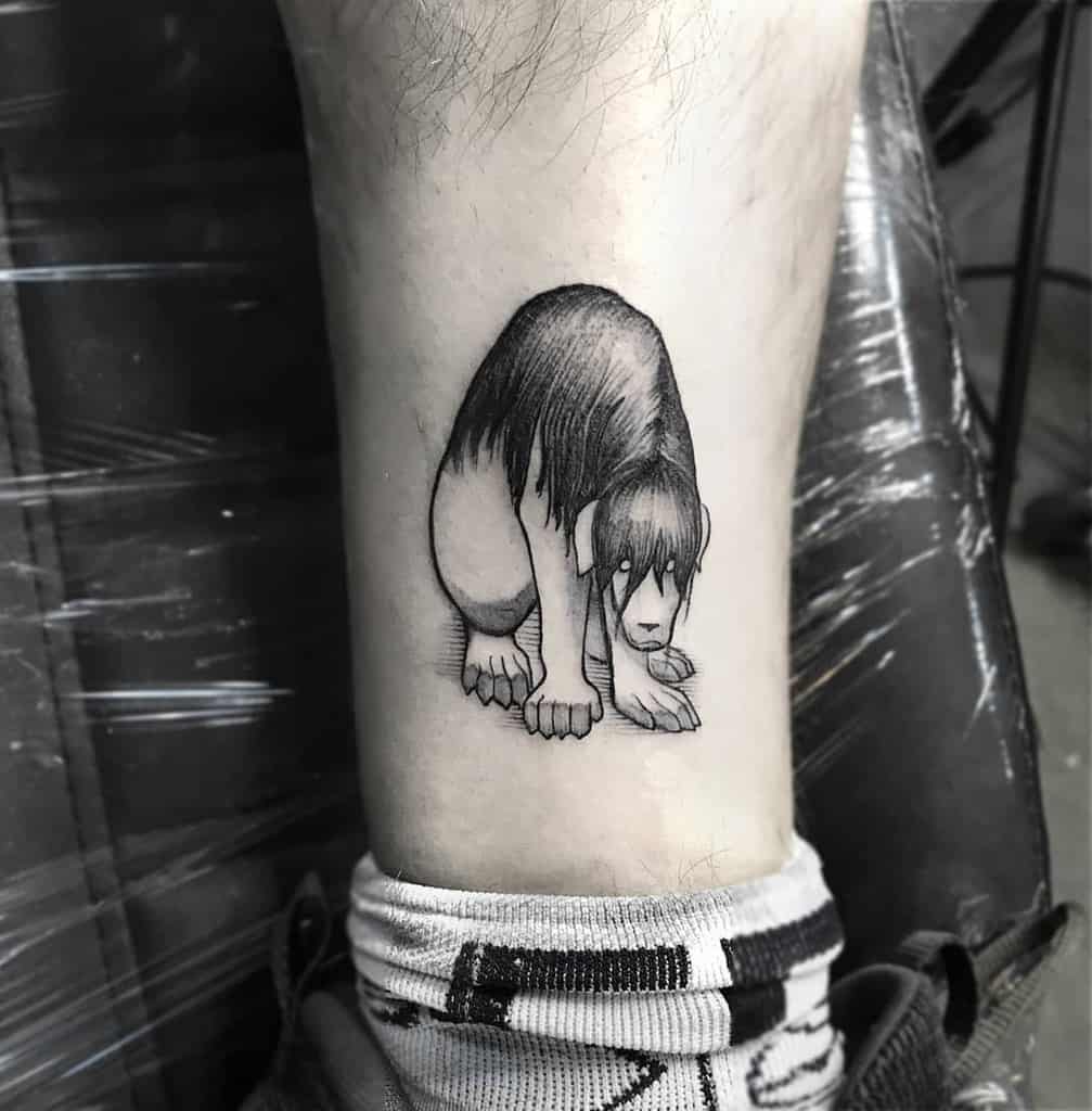Fullmetal Alchemist tattoo of Nina Tucker’s tragic chimera form, depicted in black and grey shading with a solemn, haunting expression