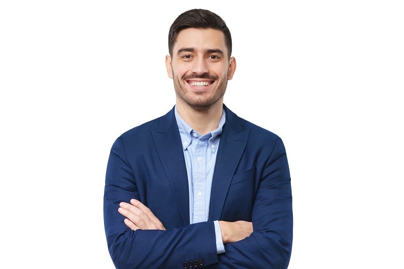 Business,Man,In,Blue,Blazer,,Standing,In,Front,Of,Camera