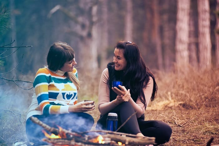 Woman Talking In Forest