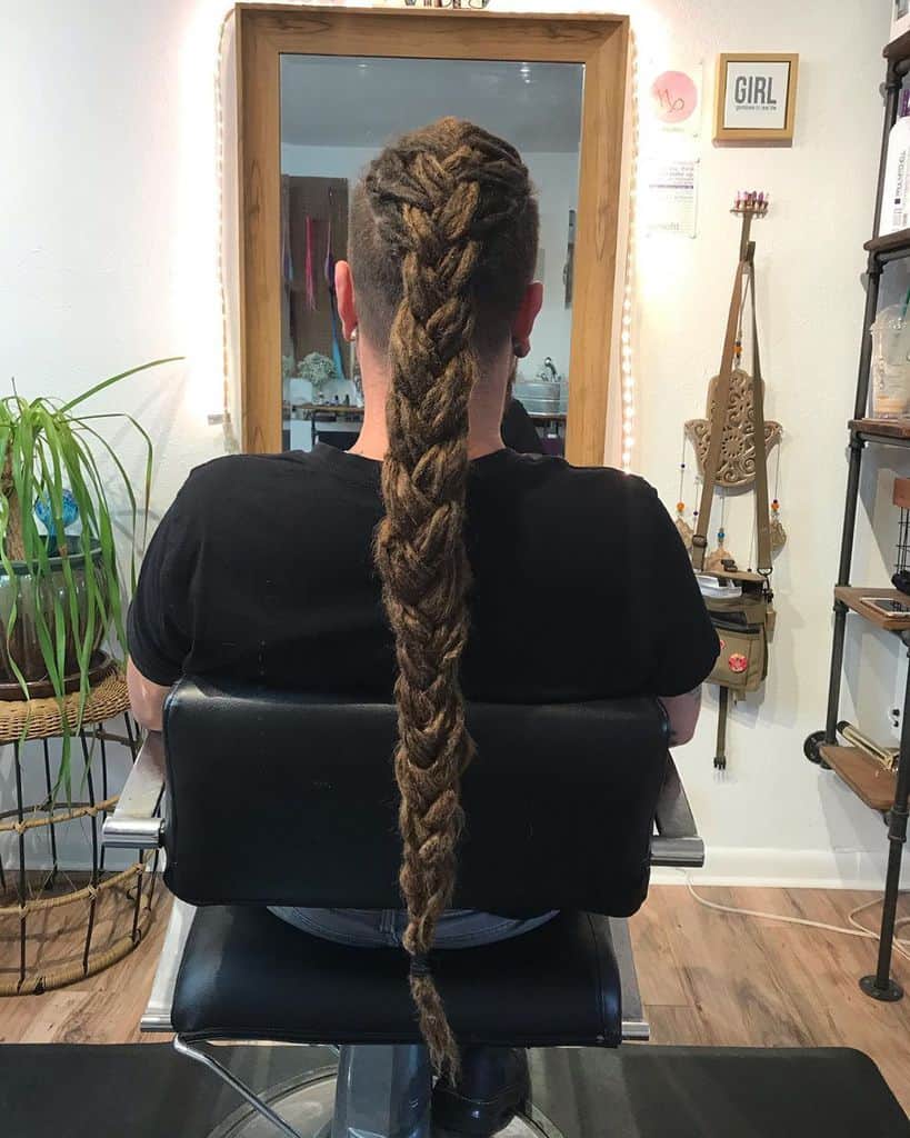 Woman With Three Tier Braided Dreadlocks