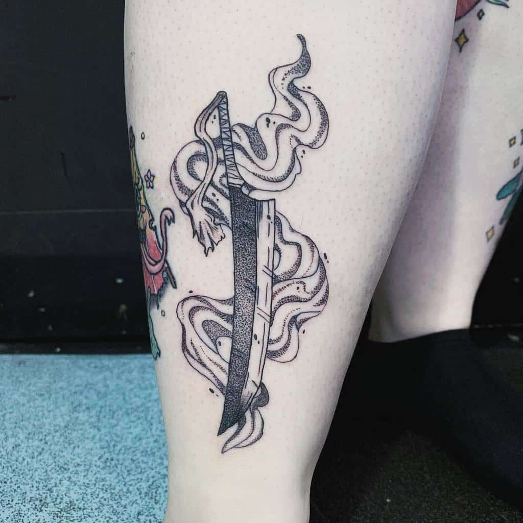 Black ink tattoo of a Zanpakutō from Bleach, featuring intricate dotwork shading, flowing cloth details, and a worn blade