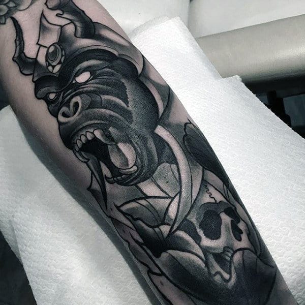 Abstract Artistic Male Gorilla Tattoo Holding Skull