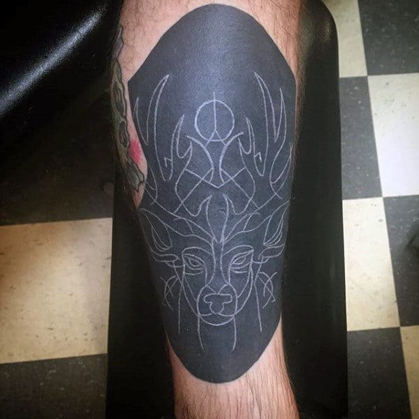 Abstract Deer Tattoo With White Ink Over Black For Guys On Leg