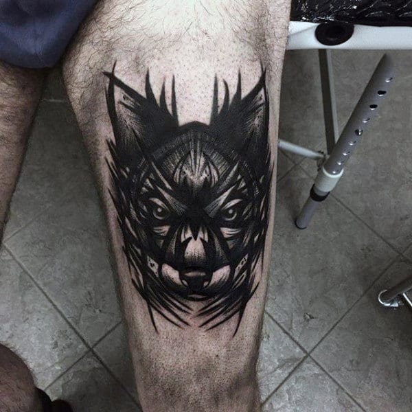 Abstract Dog Tattoo On Mans Upper Leg Thigh