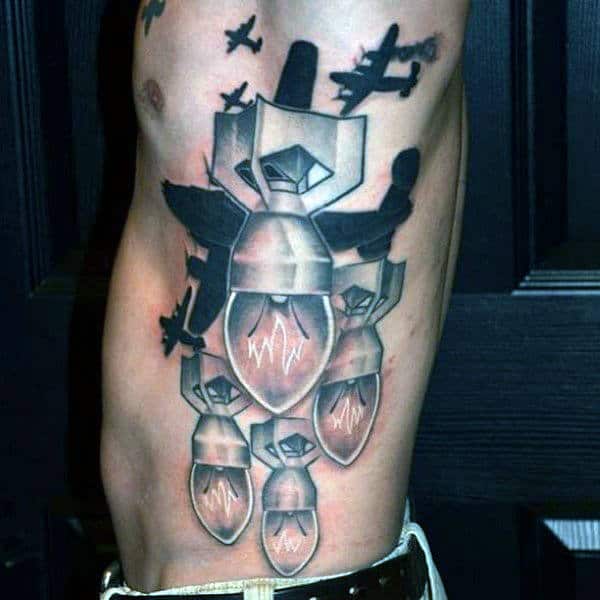 Abstract Light Bulb Airplane Bomber Tattoo On Ribs