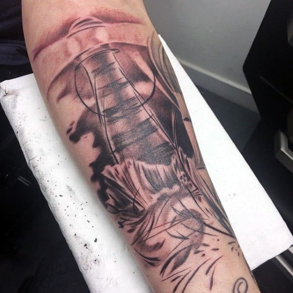 Abstract Lighthouse Mens Tattoo On Inner Forearm