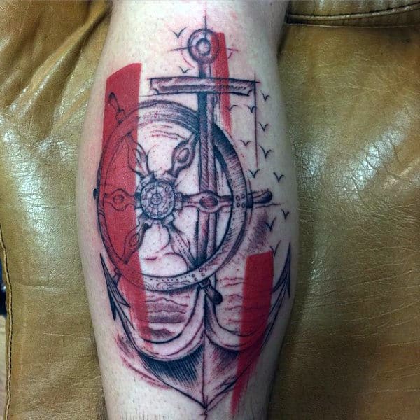 Abstract Modern Ship Wheel Leg Calf Tattoo On Man