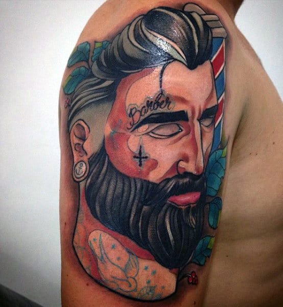 Abstract Tattoo Of Male Barber On Upper Arm